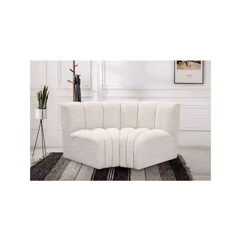 Sofá modular de tela bouclé