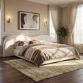 Estructura de cama moderna de madera tapizada en borreguito bouclé con cabecero curvo