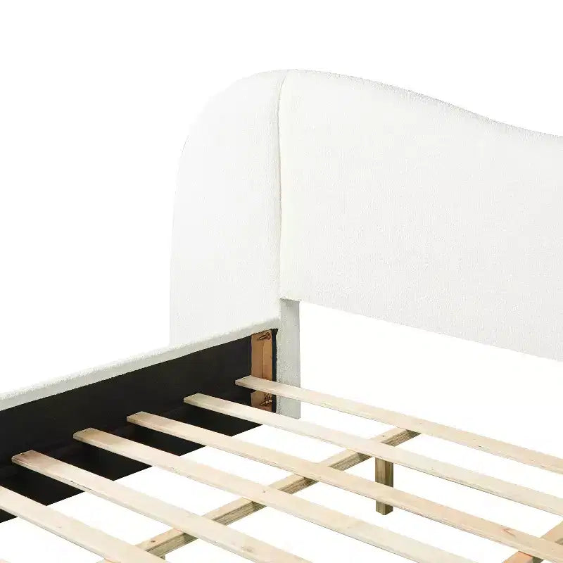 Estructura de cama moderna de madera tapizada en borreguito bouclé con cabecero curvo